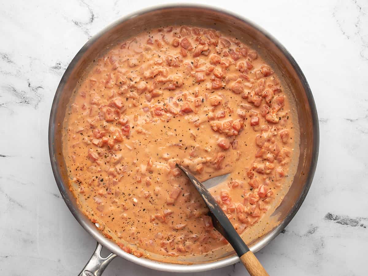 Thick and creamy tomato sauce in the skillet.
