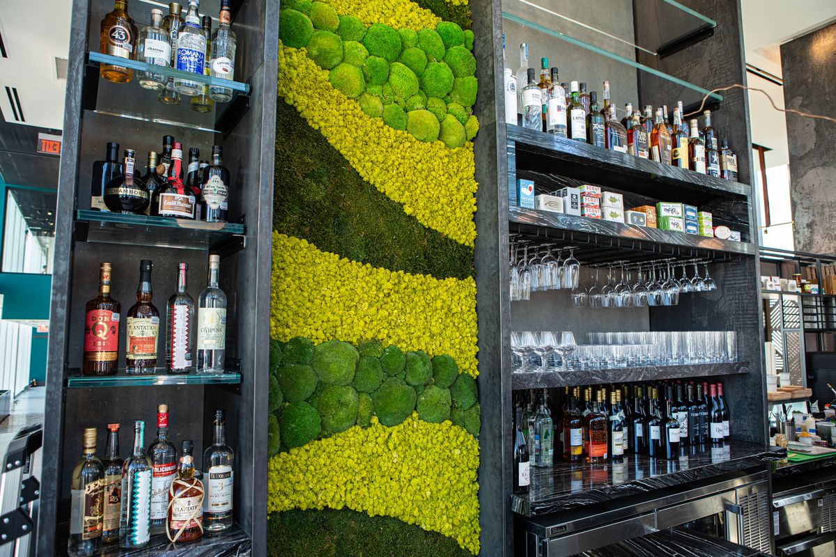 A bar with green walls.