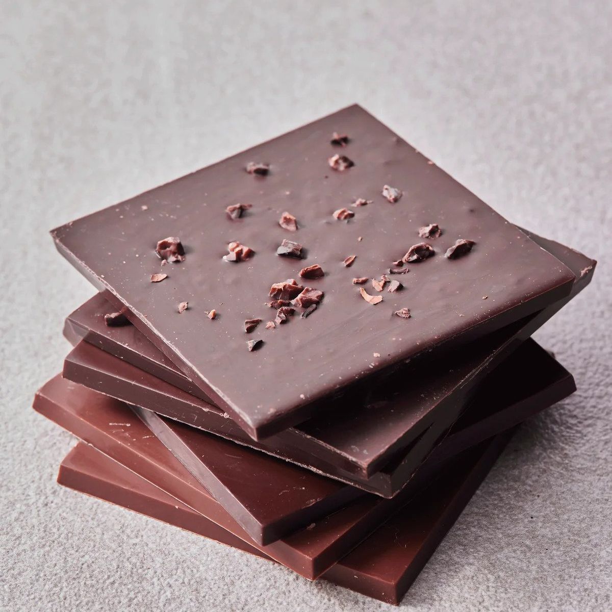 A stack of square pieces of chocolate