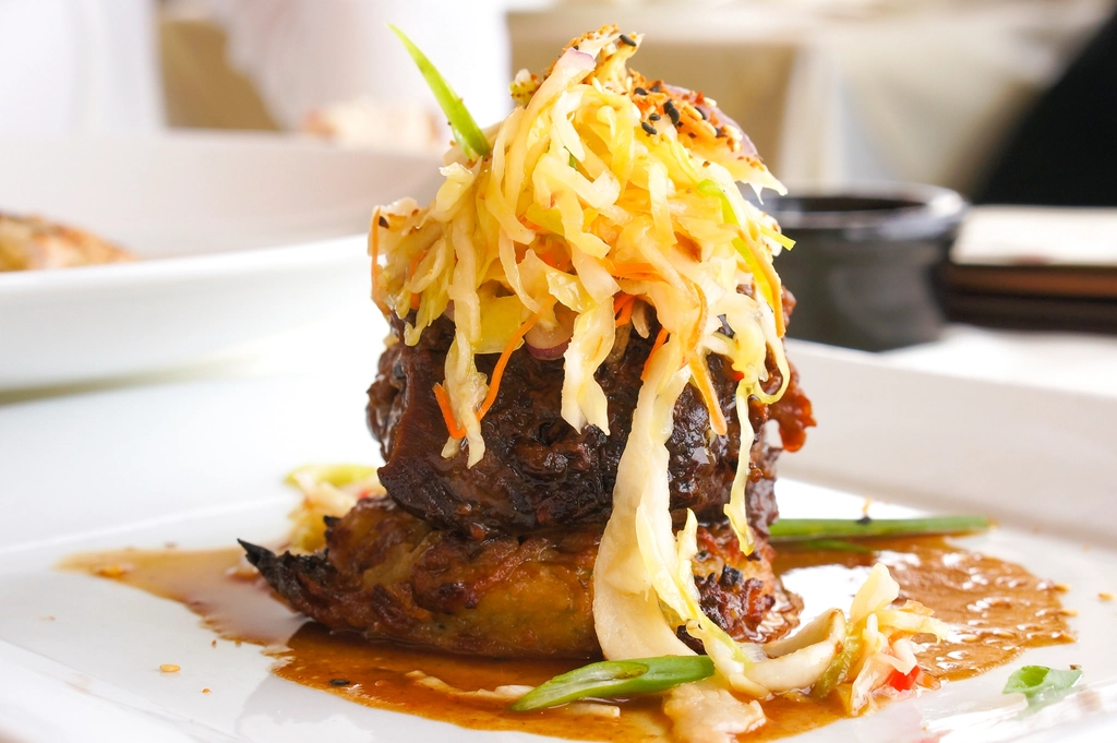 Gourmet steak dinner topped shredded