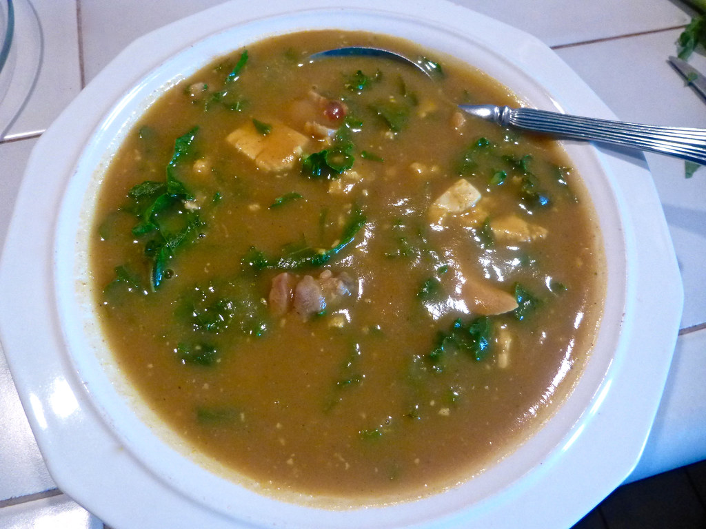 Bowl of roasted butternut squash soup on a bistro table