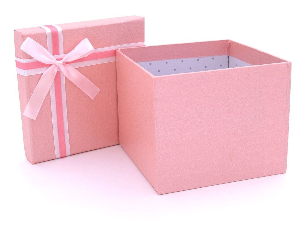 A wrapped gift box tied with ribbon