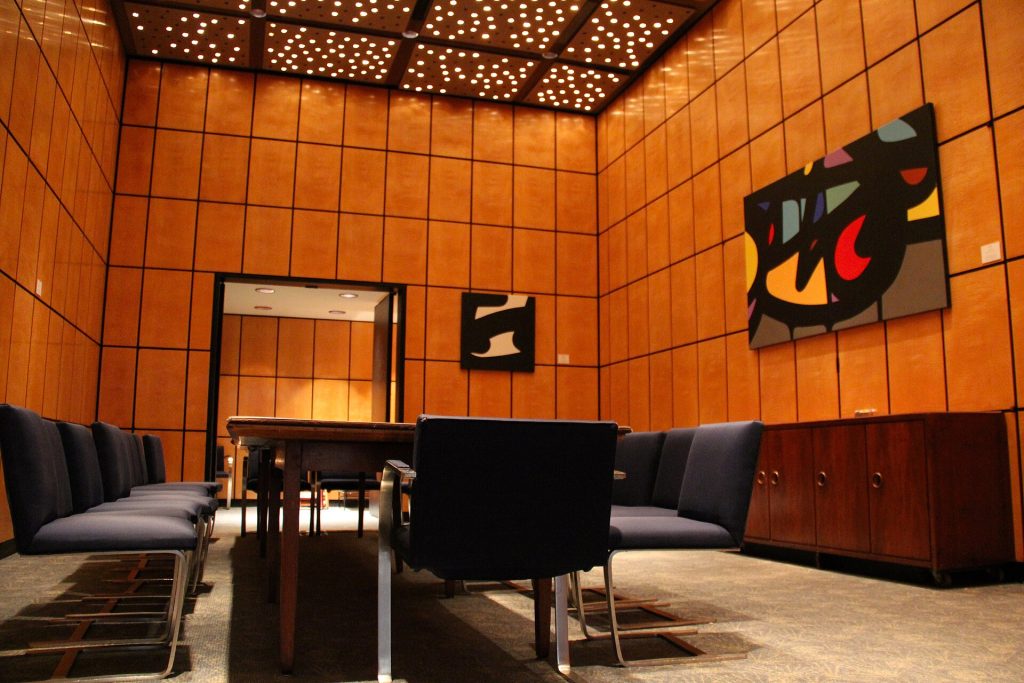 A private dining room in a restaurant set for a group event