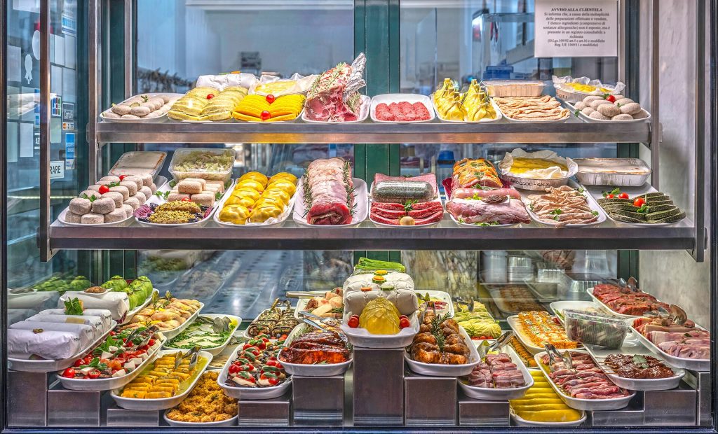Trays of fresh pasta on display in an Italian food shop