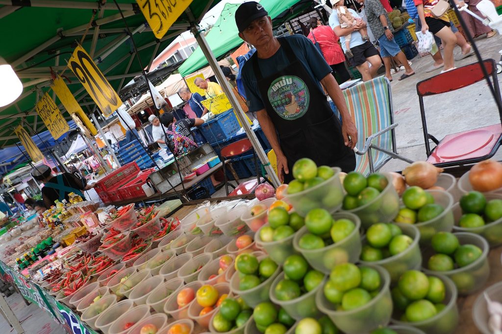Crates of fresh fruit and vegetables at a produce stand