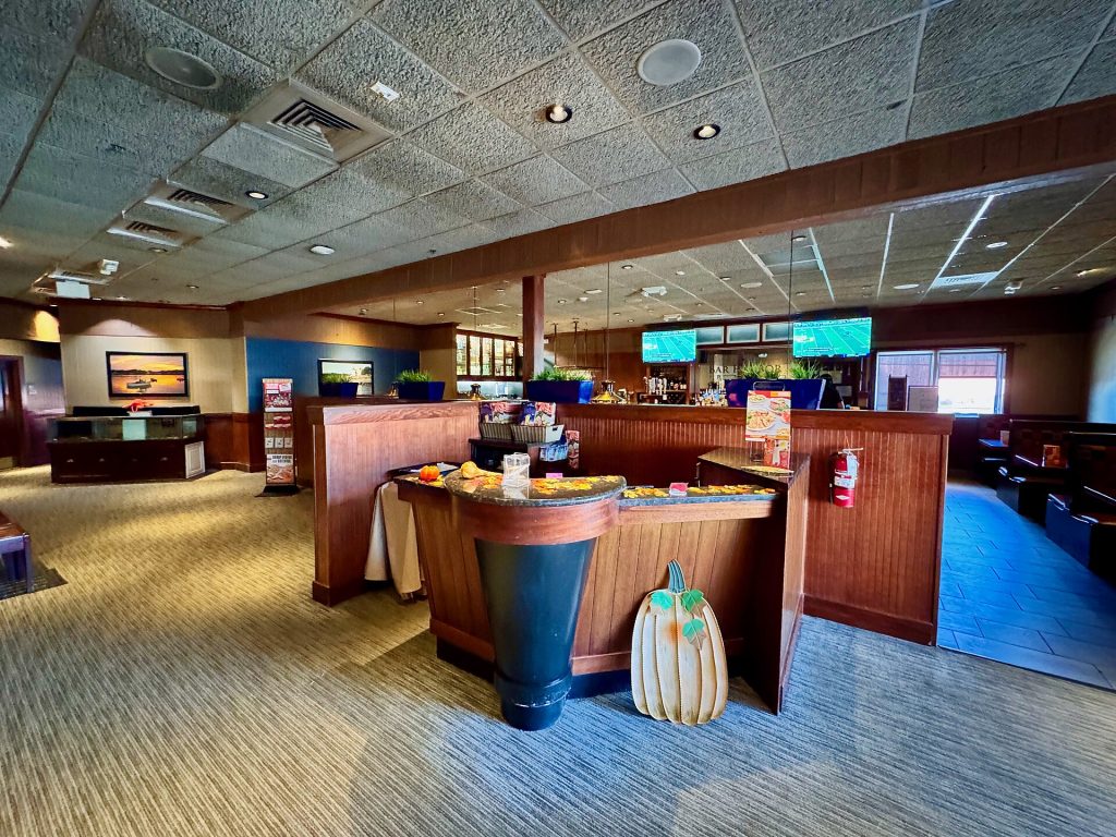 A host stand at the entrance of a restaurant