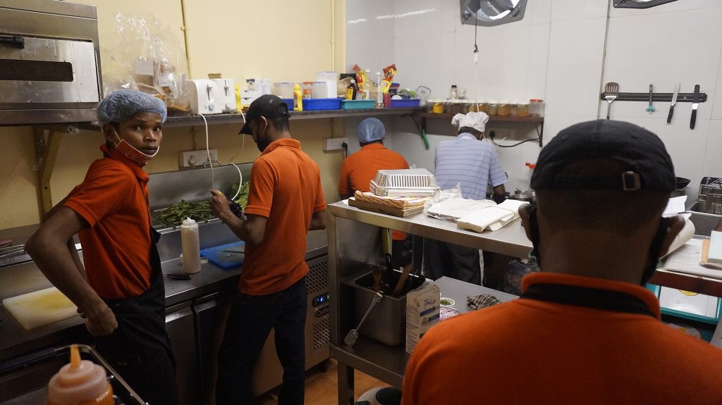Restaurant kitchen staff during service